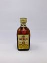 BELLS DE LUX 12 YEAR OLD 70% PROOF MINIATURE BELLS DE LUX 12 YEAR OLD 70% PROOF MINIATURE
