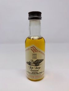 BOWMORE 10 YEAR OLD FORTH ROAD BRIDGE CENTENNIAL MINIATURE BOWMORE 10 YEAR OLD FORTH ROAD BRIDGE CENTENNIAL MINIATURE