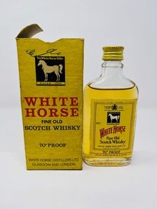 WHITE HORSE SCOTCH WHISKY MINIATURE 70% PROOF WHITE HORSE SCOTCH WHISKY MINIATURE 70% PROOF