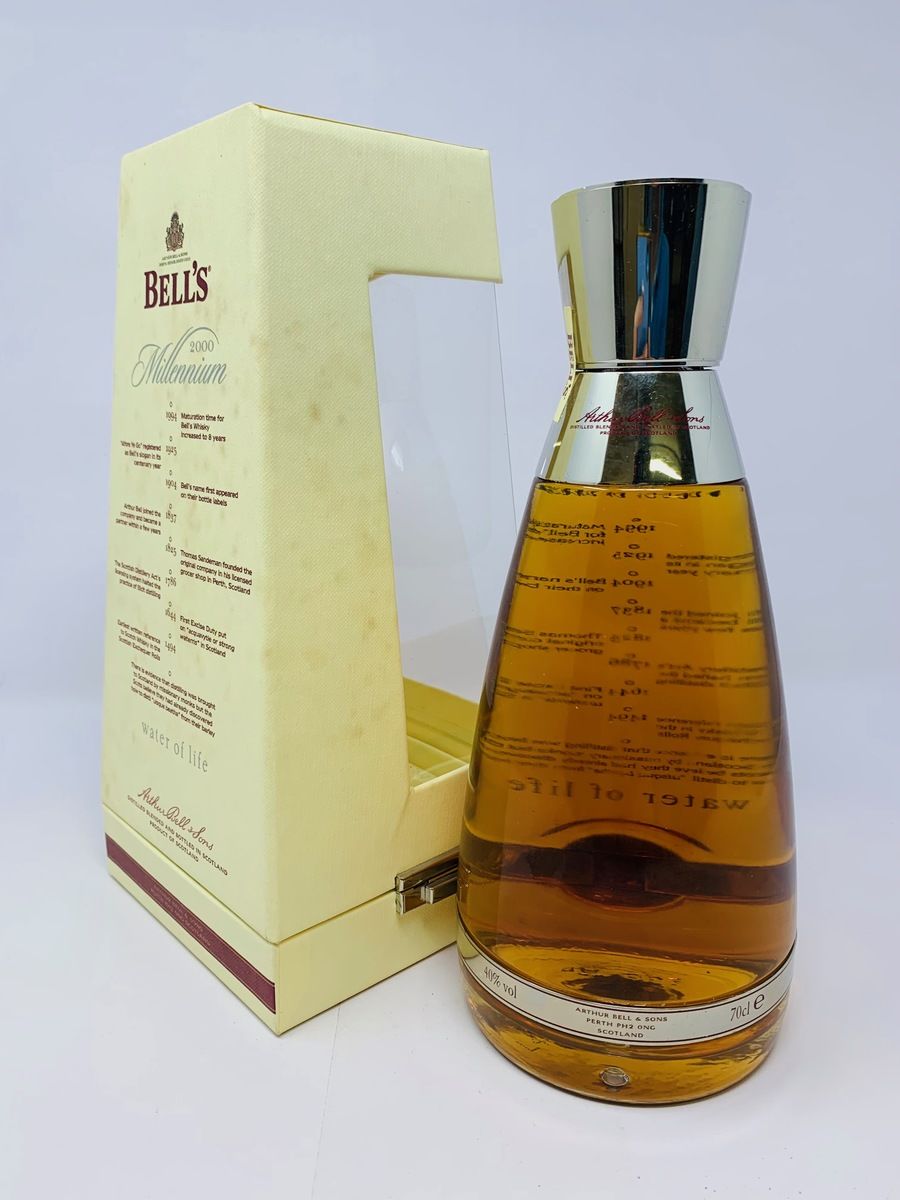 BELLS 8 YEAR OLD MILLENNIUM DECANTER 