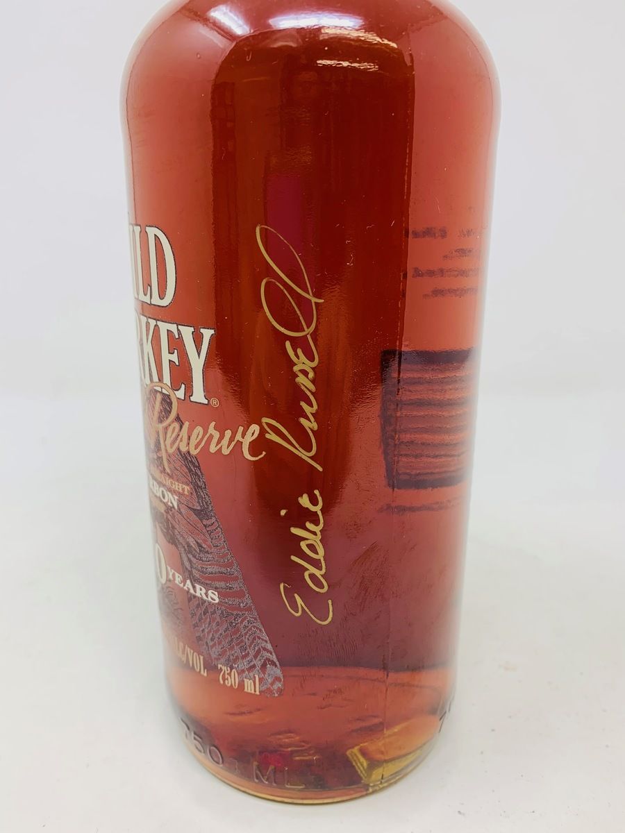 WILD TURKEY 10 YEAR OLD RUSSELS RESERVE - SIGNED BY EDDIE AND JAMES RUSSEL